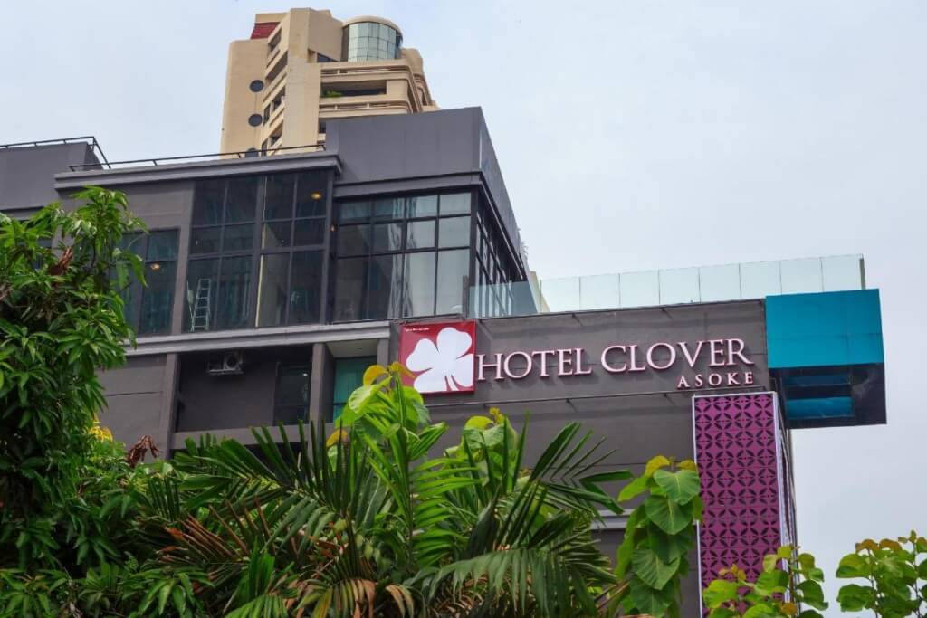 Exterior of the Hotel Clover Asoke building, located on Sukhumvit Road in the heart of Bangkok.
