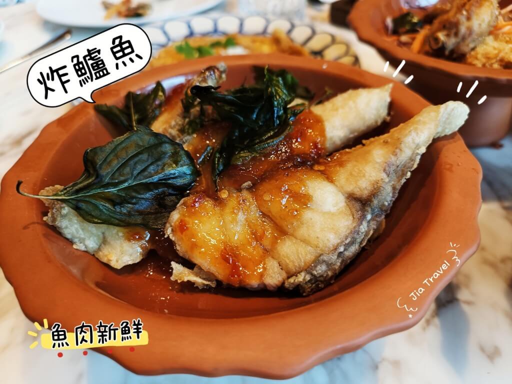 Fried sea bass fillet, highlighting the freshness of the fish.