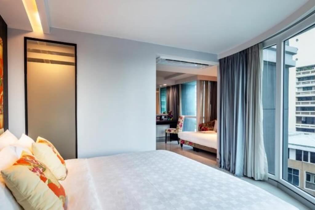 Clover Asoke Hotel's family room is spacious and tidy, making it ideal for family trips.