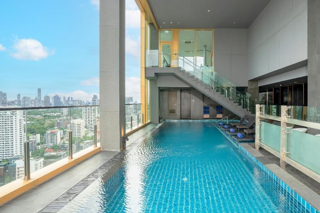 Solaria Nishitetsu Hotel's rooftop pool has killer views of the Bangkok skyline at night.