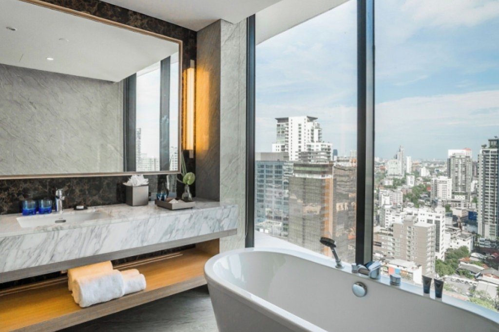 Bathtub in bathroom at Skyview Hotel Bangkok Sukhumvit 24 for relaxing soak
