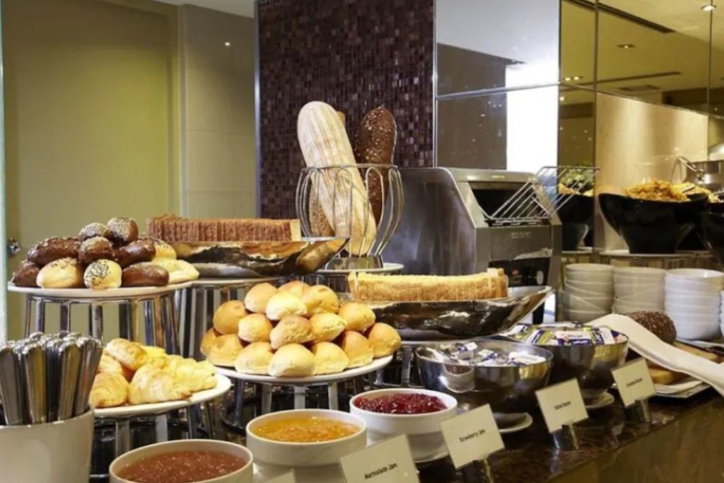 Emporium Suites by Chatrium breakfast buffet with wide variety of international cuisine including Thai omelet