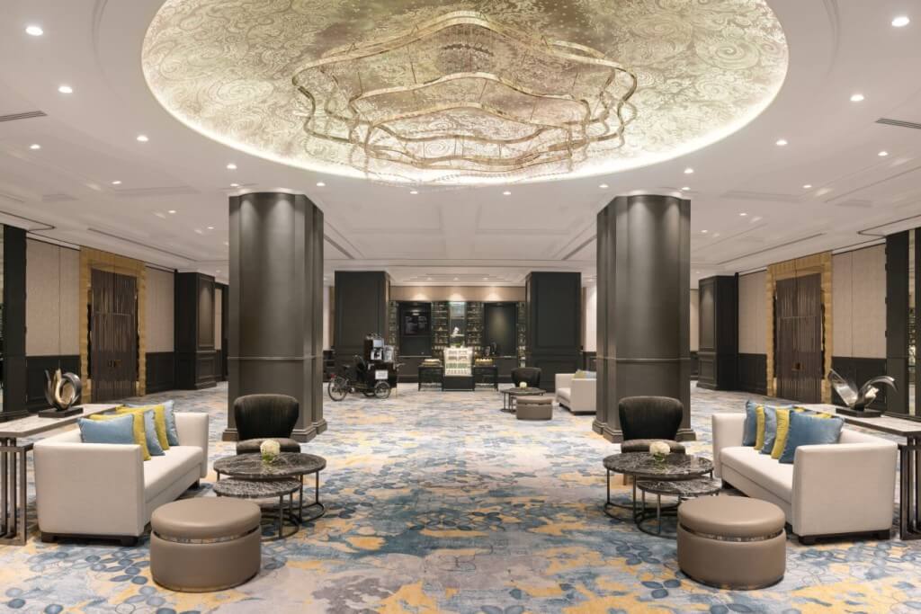 Intercontinental Bangkok lobby lounge multiple premium sofa sets with wide spacing for privacy
