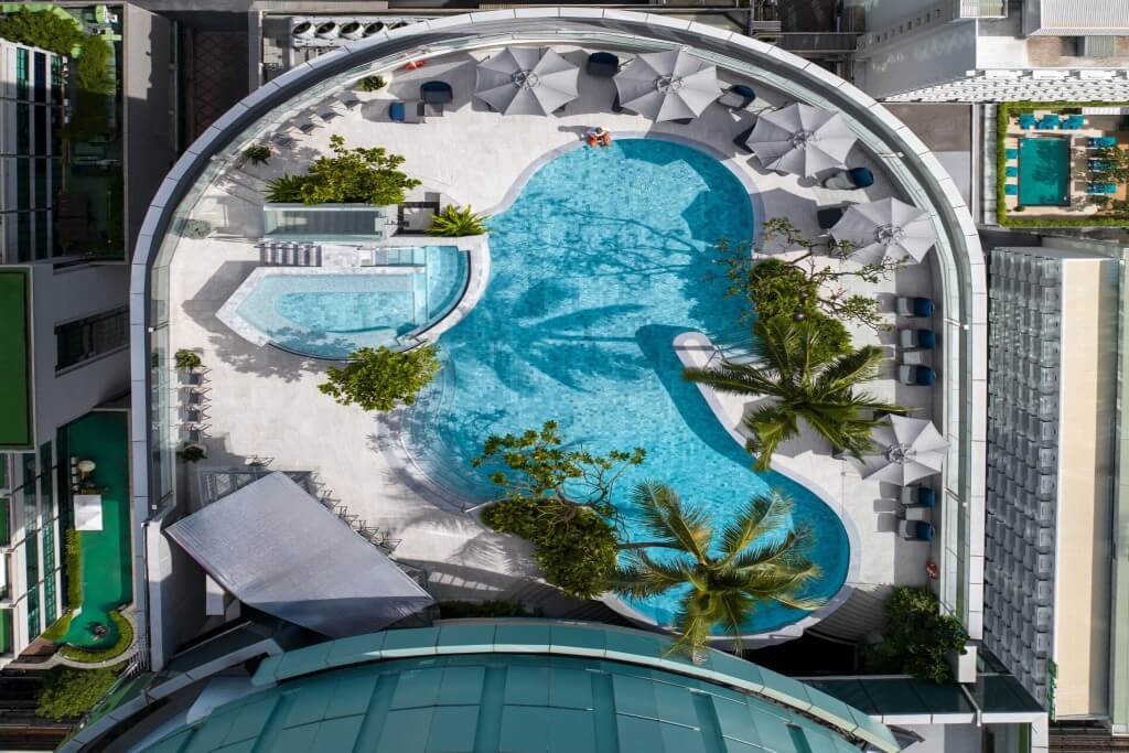 Intercontinental Bangkok rooftop swimming pool with unique shape and clean water
