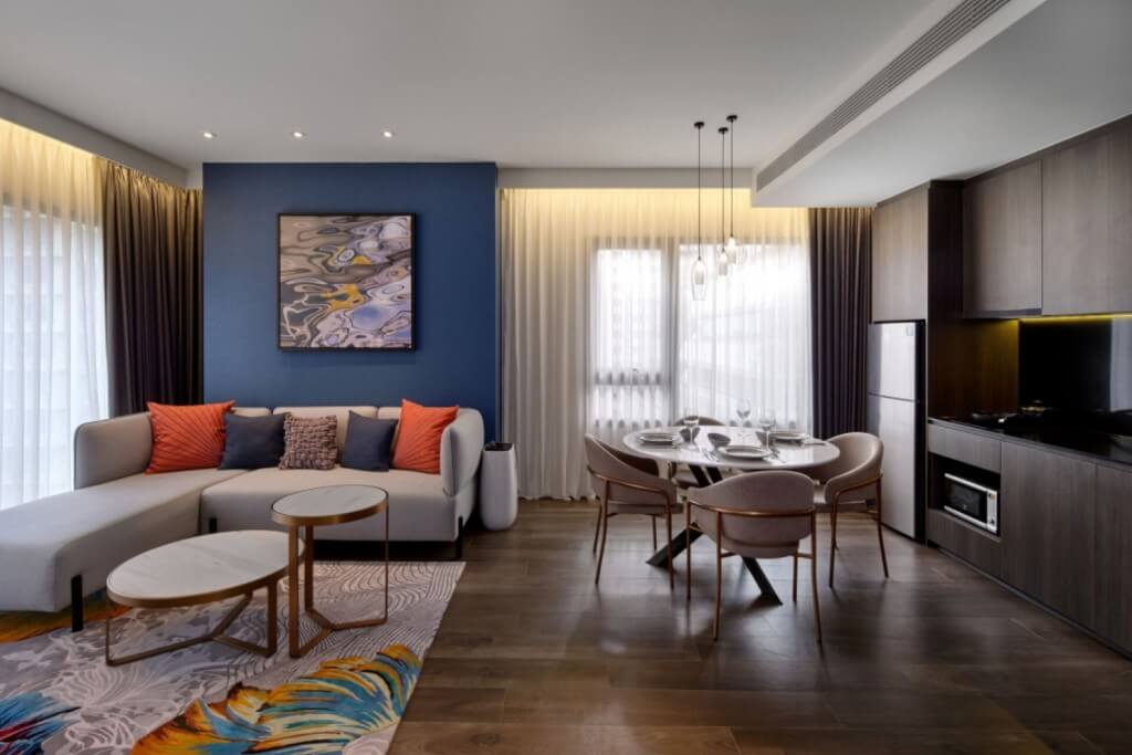 Sindhorn Midtown Hotel Bangkok Vignette Collection by IHG living room dining area full kitchen like home