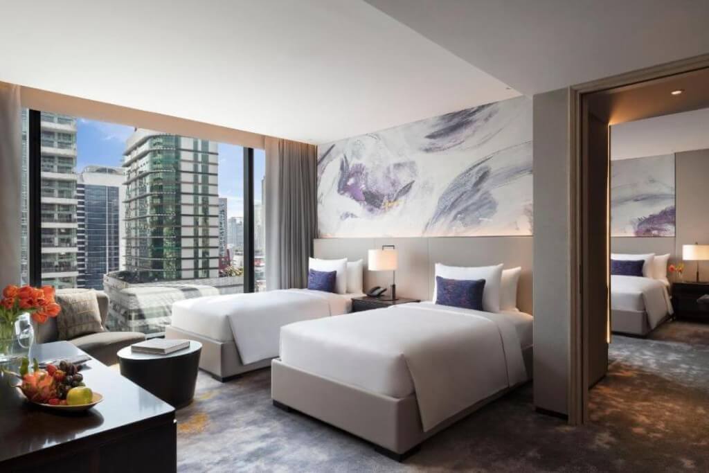 Spacious & cozy twin room at Carlton Hotel Bangkok Sukhumvit — super comfy and relaxing vibes.