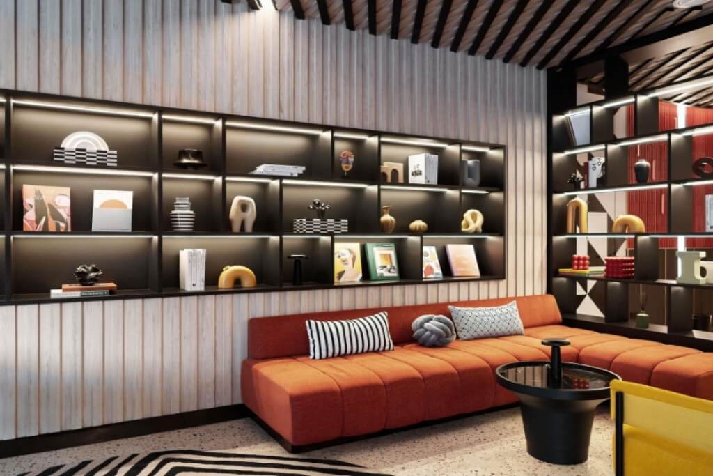 Tribe Living Bangkok Sukhumvit 39 lobby lounge area with vibrant and energetic visual design