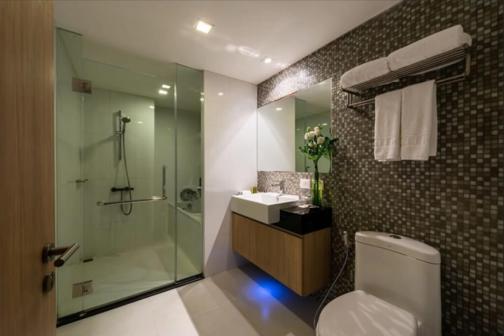 Maitria Hotel Sukhumvit 18 bathroom with separate shower and modern fixtures
