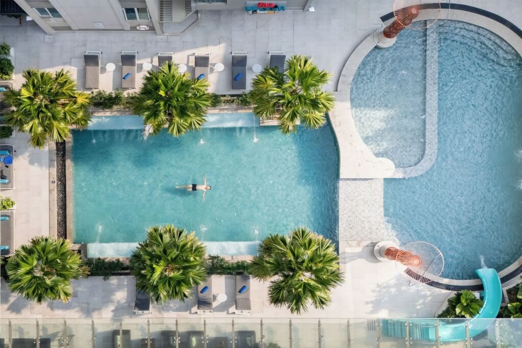 Outdoor swimming pool at Novotel Living Bangkok Sukhumvit Legacy