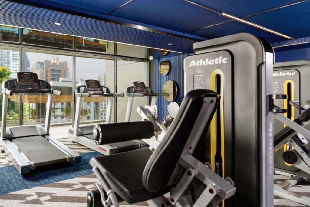 Tribe Living Bangkok Sukhumvit 39 24-hour gym fitness room with modern equipment