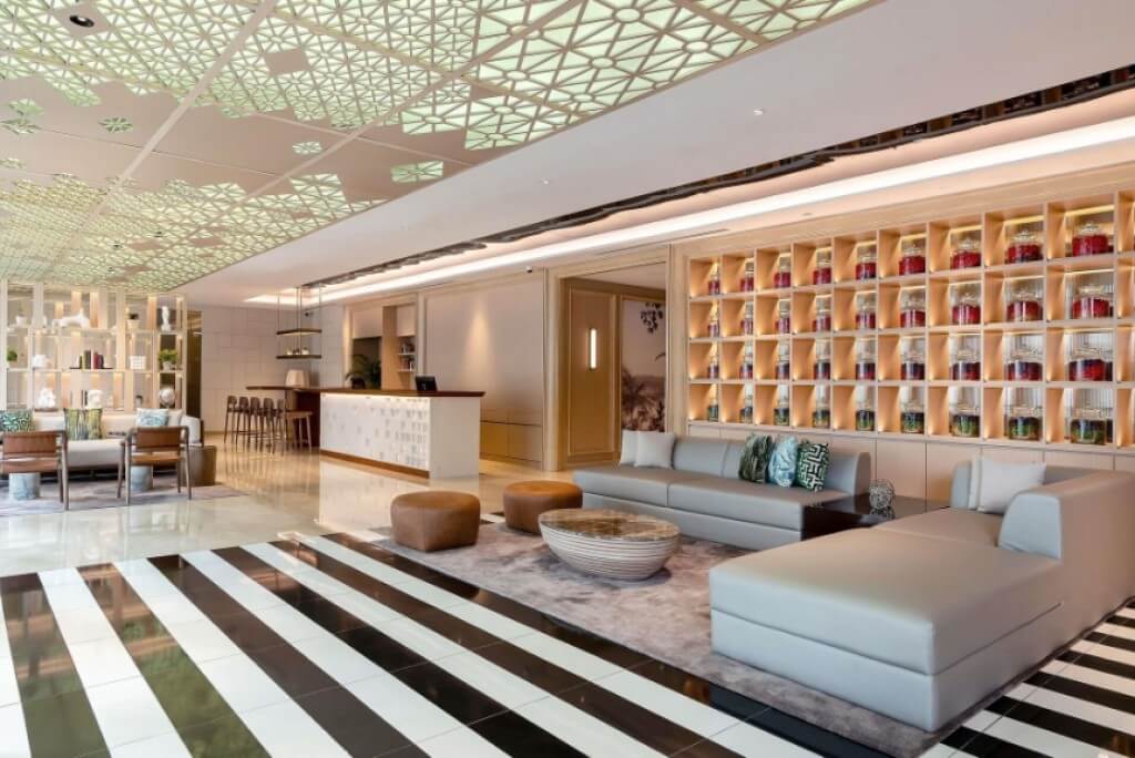 Modern lobby and comfortable seating area at Novotel Living Legacy Bangkok
