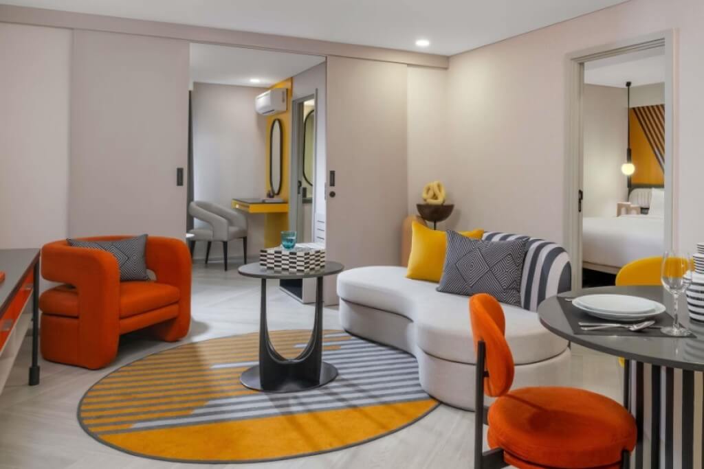 Tribe Living Bangkok Sukhumvit 39 spacious living room area with consistent modern design style