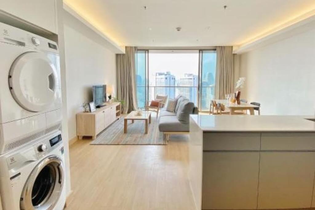 Oakwood Suites Bangkok clothes dryer in room for convenience