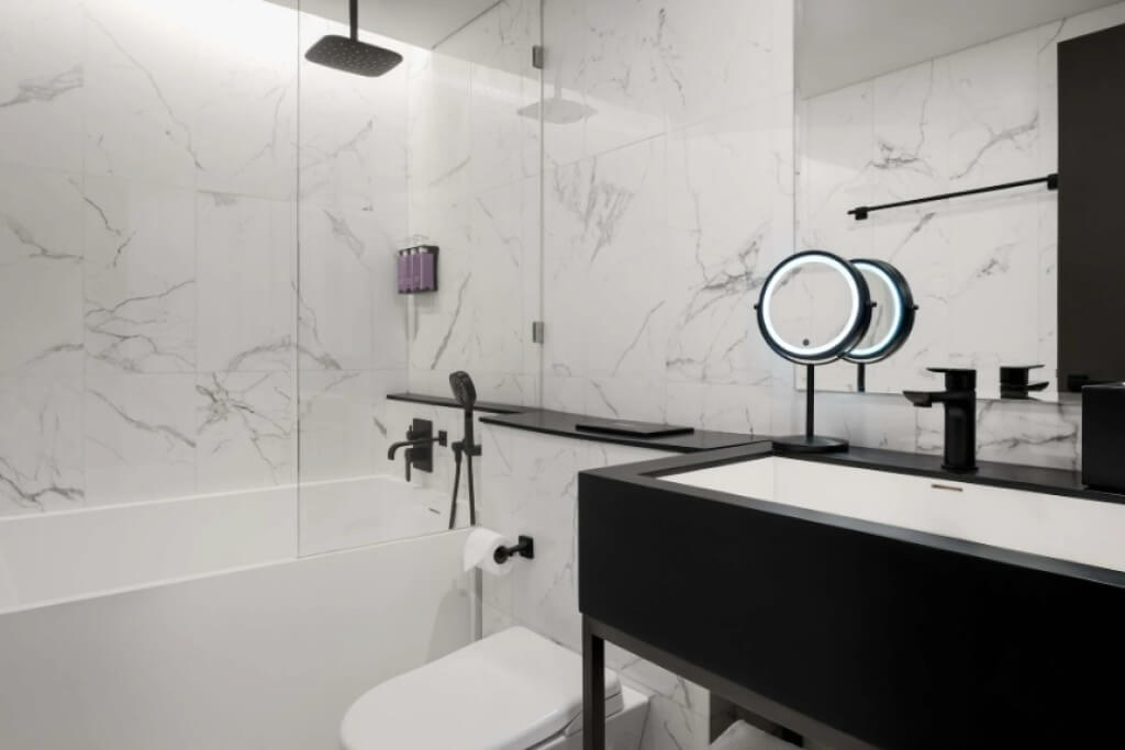 Tribe Living Bangkok Sukhumvit 39 bathroom with bathtub for relaxing soak