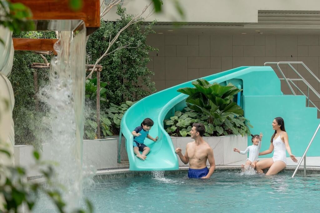 Kids pool with water slide at Novotel Living Legacy Bangkok
