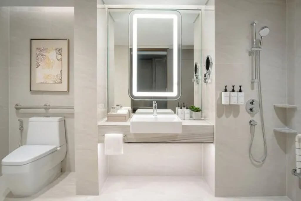 Spacious and modern bathroom in a Double Room at InterContinental Bangkok, with a clean, sleek design.