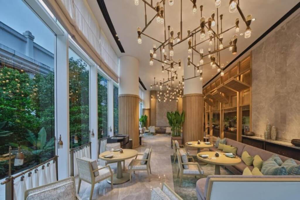 High-end breakfast seating area with cafe-like atmosphere at Waldorf Astoria Bangkok