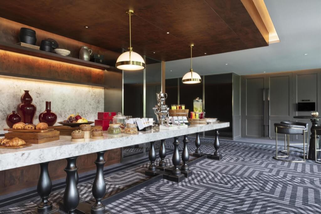 Breakfast buffet spread at Sindhorn Kempinski Hotel Bangkok with Thai dishes