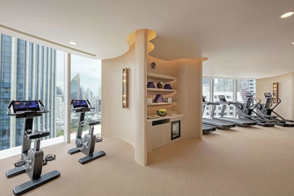 Large and well-equipped gym fitness center at Waldorf Astoria Bangkok hotel