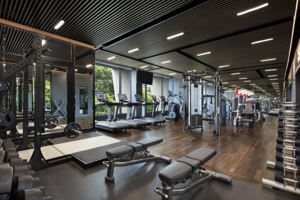 Large gym with wide variety of equipment at Sindhorn Kempinski Hotel Bangkok