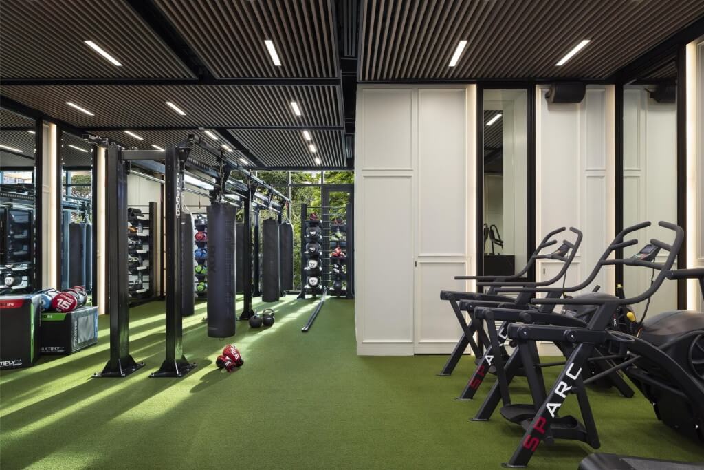 Fitness room with punching bag at Sindhorn Kempinski Hotel Bangkok