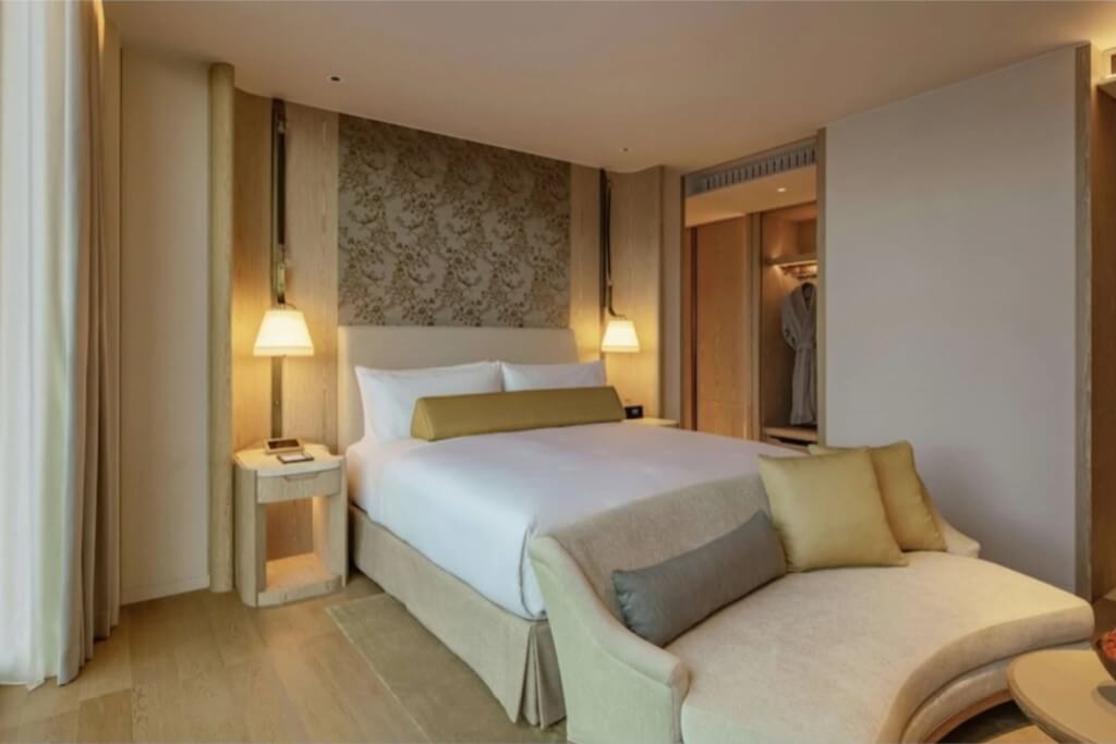 Warm and relaxing wood tone interior design of Waldorf Astoria Bangkok hotel room