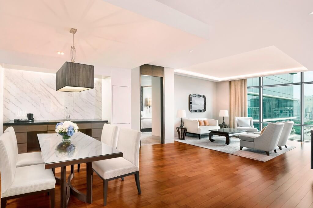 spacious suite living room and separate dining area at The St. Regis Bangkok