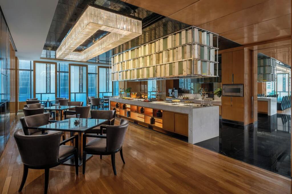 Bright breakfast seating area at Renaissance Bangkok Ratchaprasong Hotel