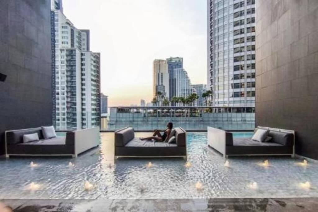 Ascott Thonglor Bangkok outdoor swimming pool with unique in-water loungers
