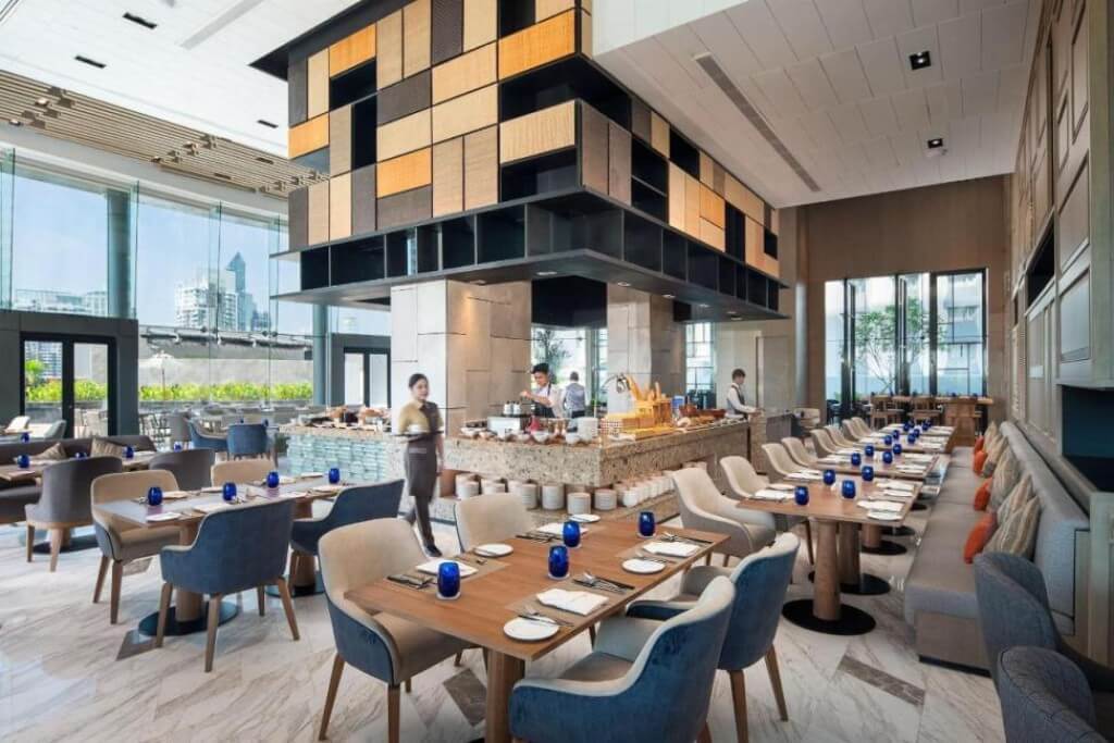 Bright and comfortable breakfast seating area at Hotel Nikko Bangkok