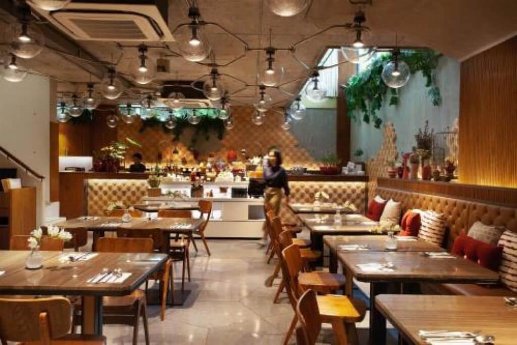 Volve Hotel Bangkok bright breakfast seating area with comfortable chairs