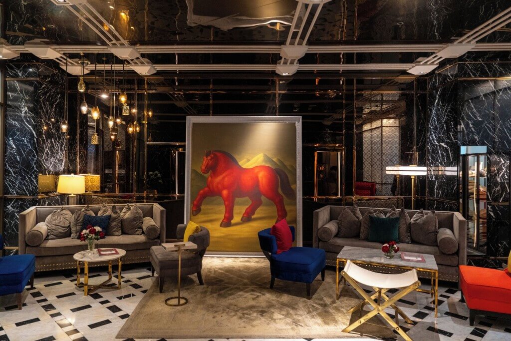 Trendy lobby decor at MUU Bangkok Hotel with stylish furniture