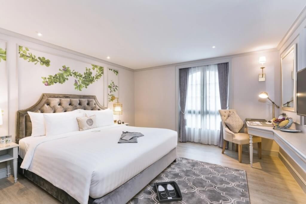 The Salil Hotel Sukhumvit 57 guest room with king bed and well-proportioned space