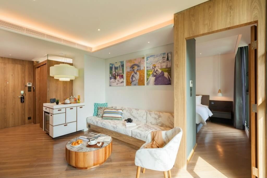 Volve Hotel Bangkok suite with separate living room and bedroom