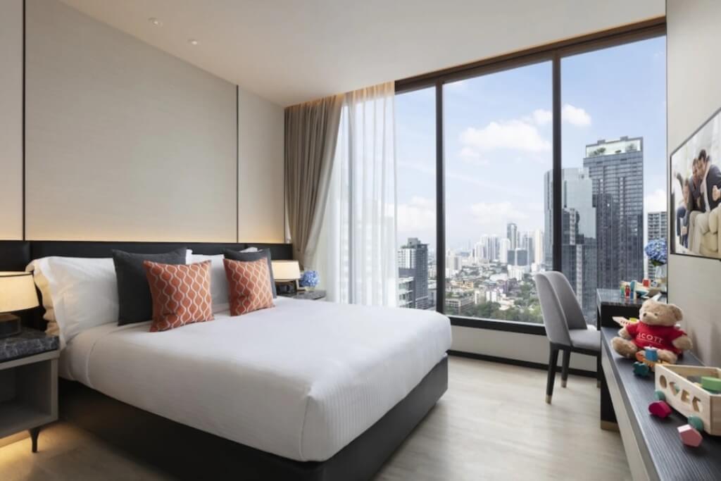Ascott Thonglor Bangkok large floor-to-ceiling window with Thonglor night view