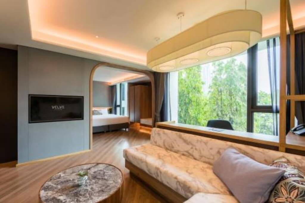 Volve Hotel Bangkok suite with full living room and dining table