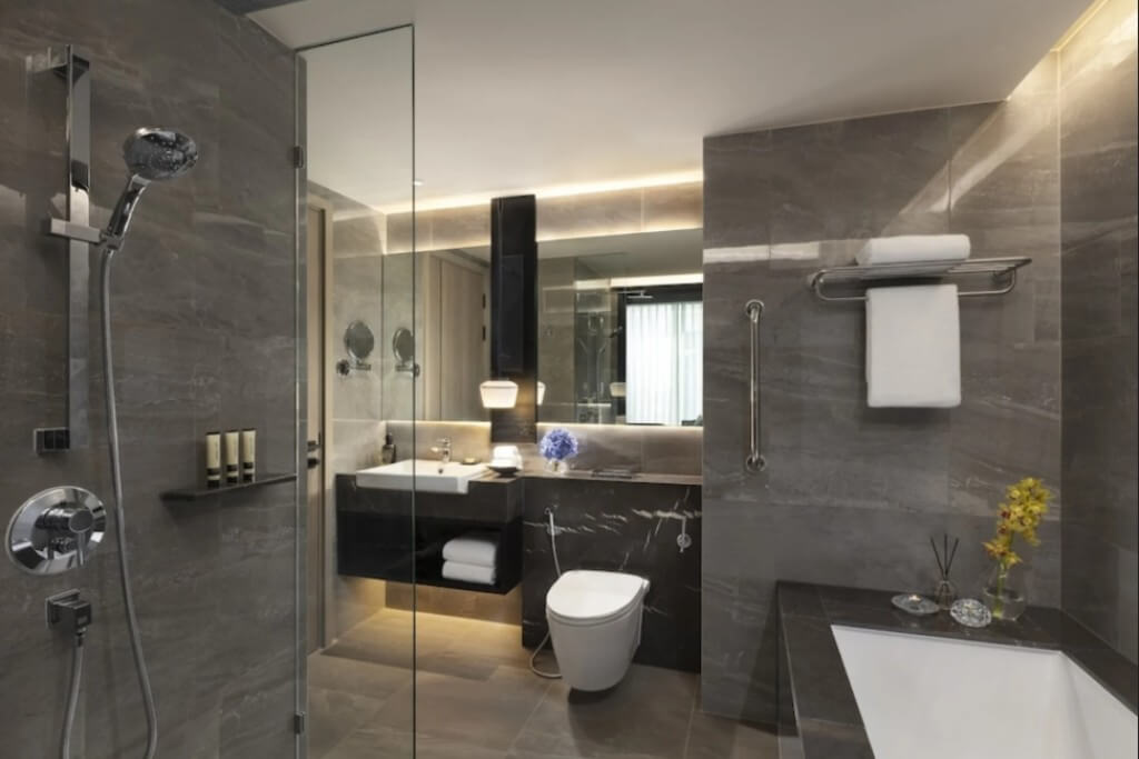 Ascott Thonglor Bangkok spacious bathroom with large vanity and rain shower