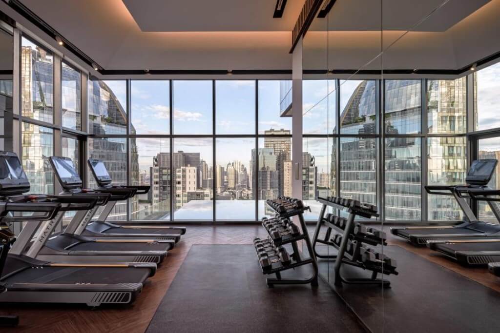 High floor gym with floor-to-ceiling windows at Intercontinental Bangkok Sukhumvit