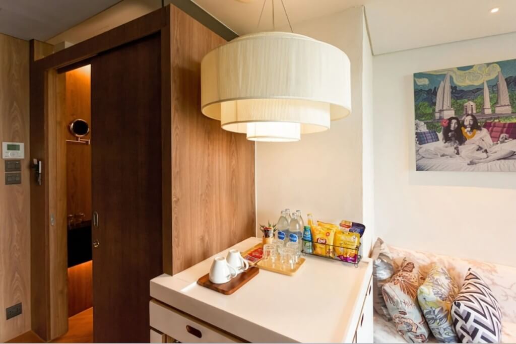 Volve Hotel Bangkok mini bar with complimentary local snacks and beverages