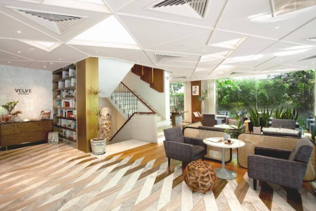 Volve Hotel Bangkok lobby lounge with green garden view and comfortable seating