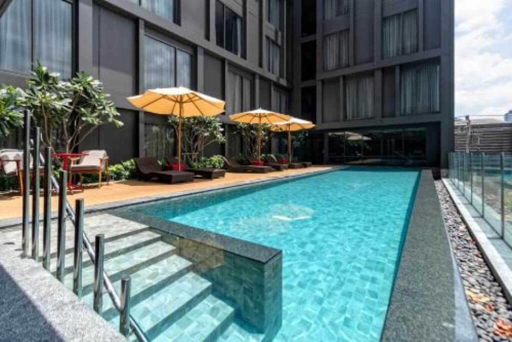 relaxing pool area with thoughtful design at Oakwood Studios Sukhumvit Bangkok