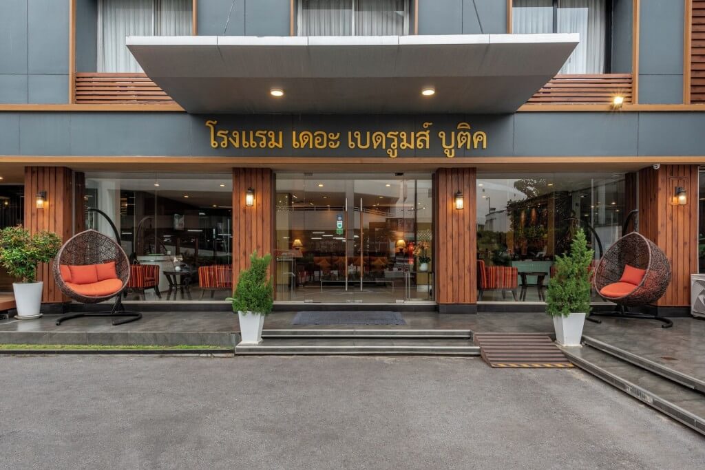 Main entrance door of The Bedrooms Boutique Hotel with key card access