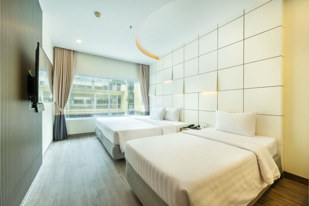 simple and clean guest room at Qiu Hotel Sukhumvit