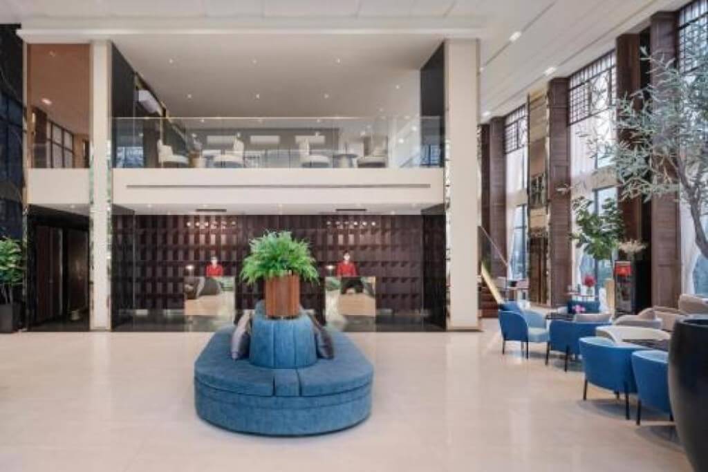 Bright and high-ceiling lobby of Ramada Plaza by Wyndham Bangkok Sukhumvit 48
