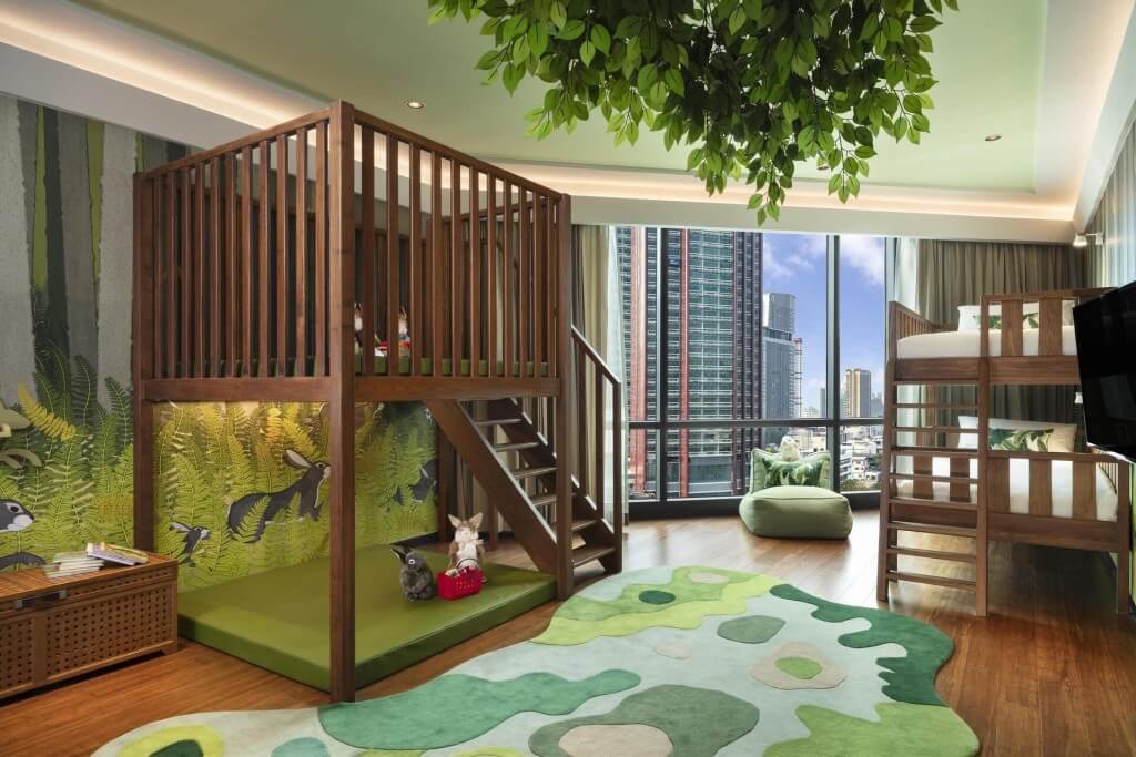 Siam Kempinski Hotel Bangkok two-bedroom family room kids room with bunk bed and treehouse loft bed