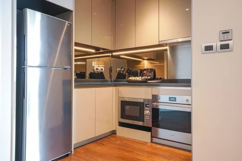 Chatrium Grand Bangkok three bedroom suite kitchen refrigerator microwave stove coffee machine