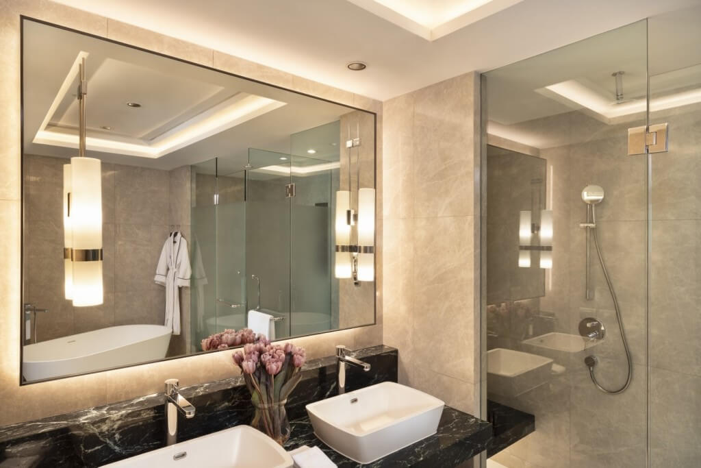 Siam Kempinski Hotel Bangkok two-bedroom family room master bathroom with double sink and dry-wet separation