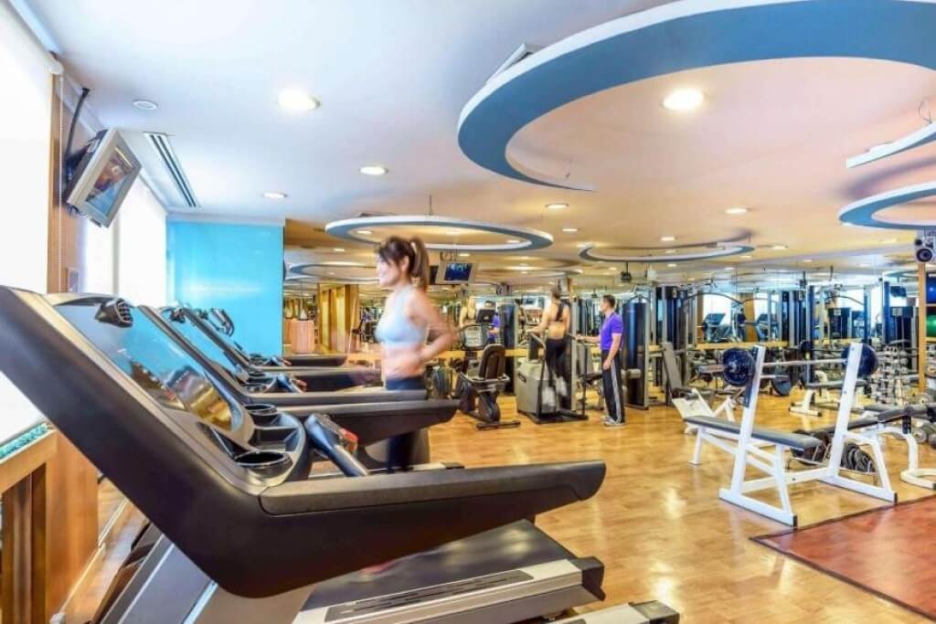 Novotel Bangkok Siam Square fitness center with multiple cardio and weight machines