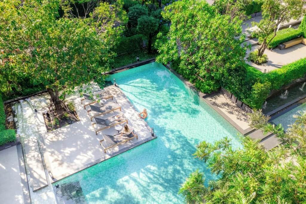 Ramada by Wyndham Bangkok Sukhumvit 87 swimming pool with plants