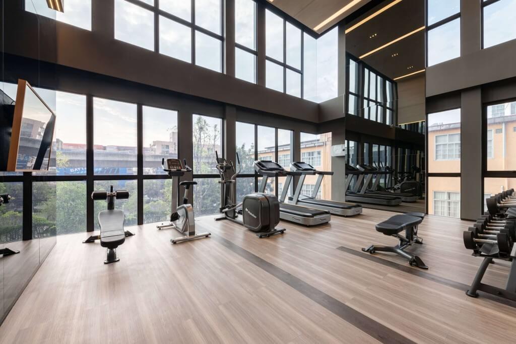 Ramada by Wyndham Bangkok Sukhumvit 87 gym with treadmill and dumbbells